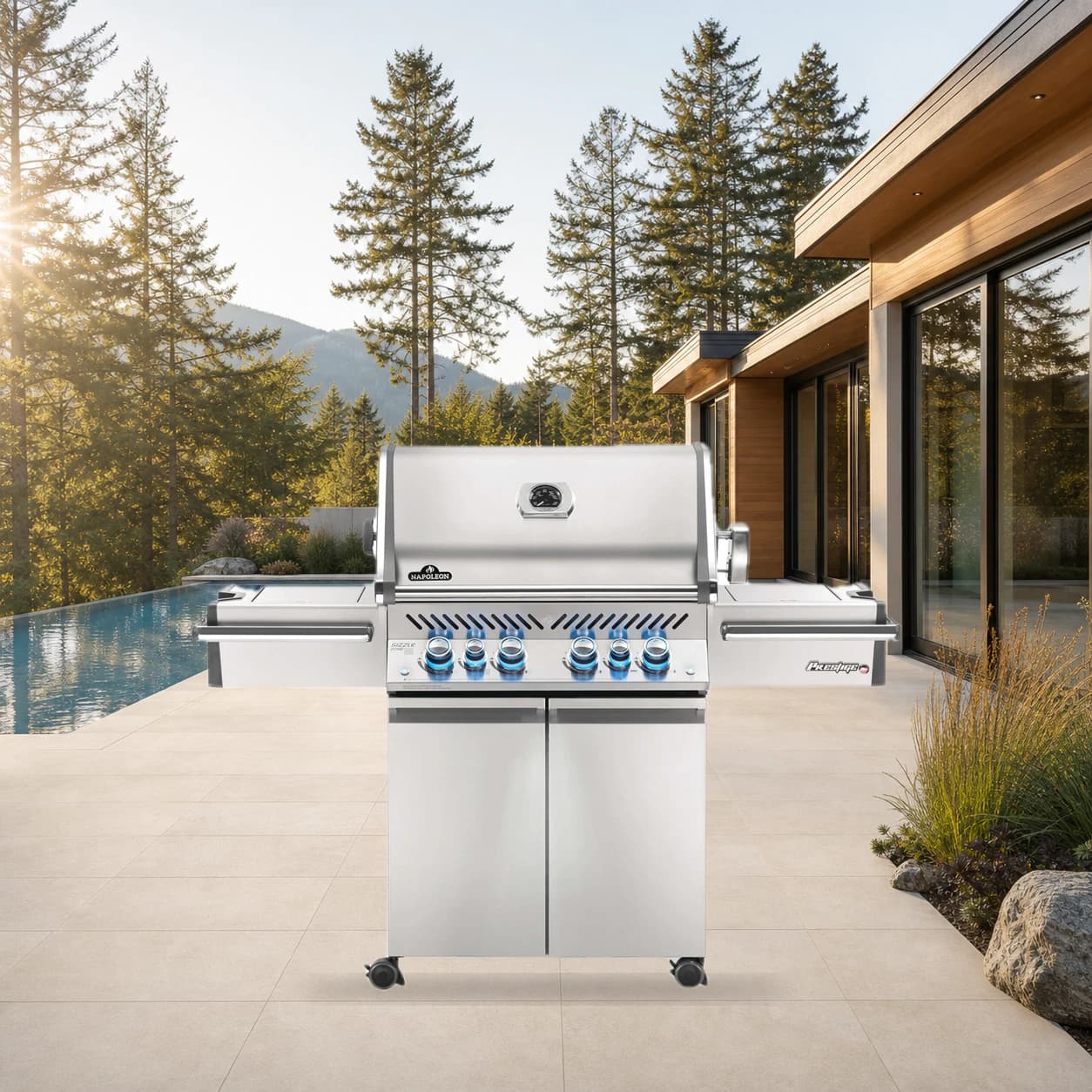 Legacy Prestige® PRO 500 Propane Gas Grill with Infrared Rear and Side Burners, Stainless Steel in a modern poolside backyard