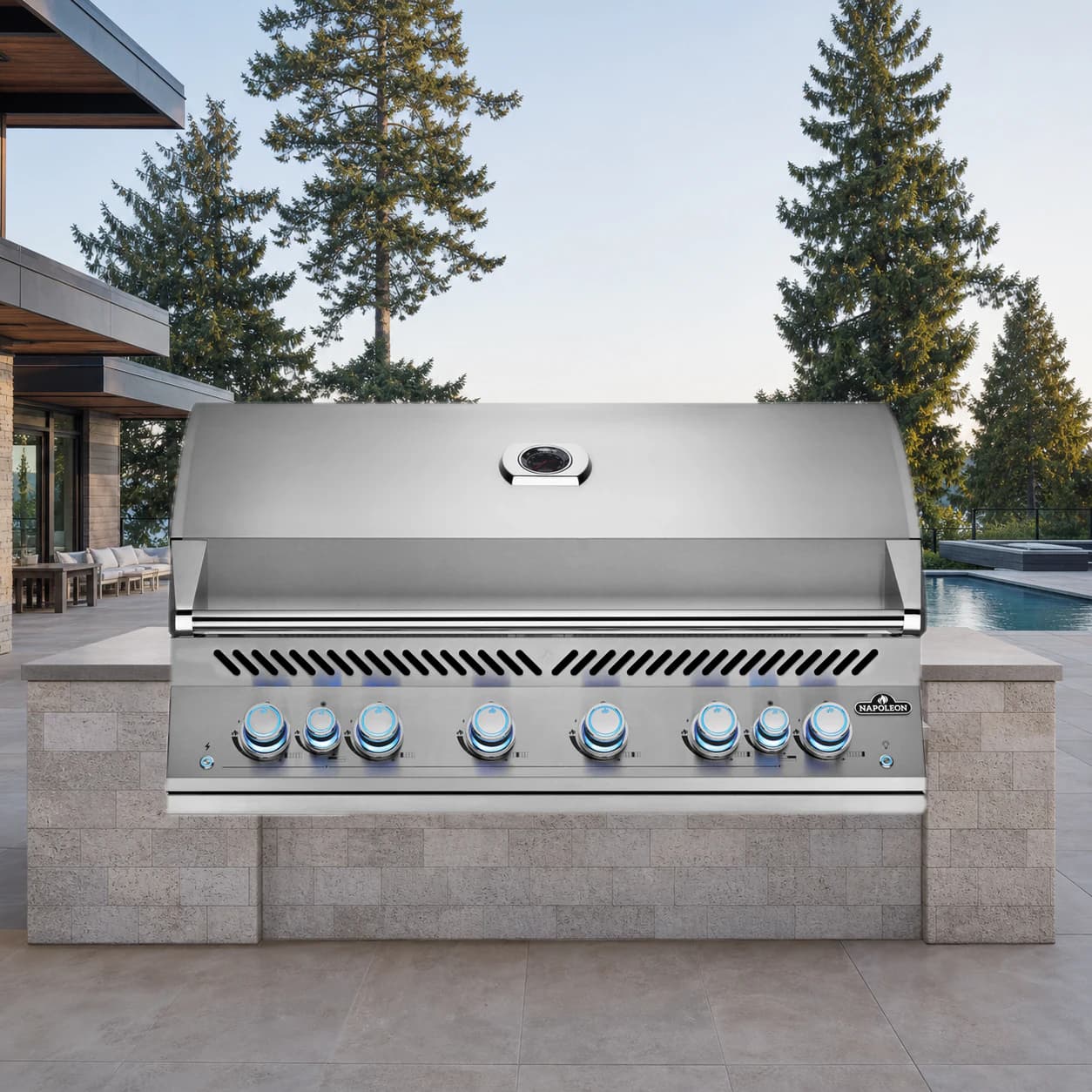 Built-In 700 Series 44" with Dual Infrared Rear Burners, Propane, Stainless Steel in a modern poolside backyard
