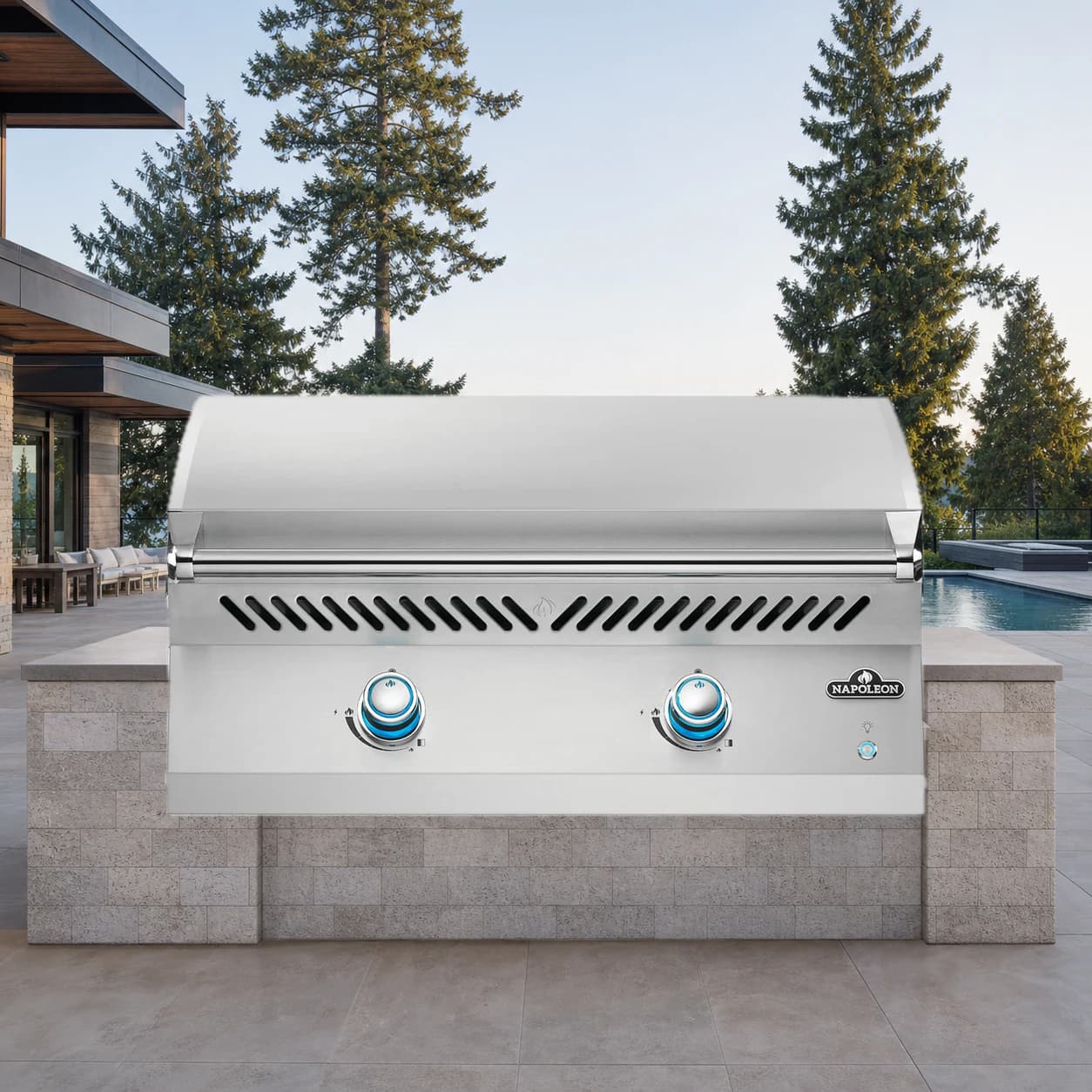 Built-In 700 Series 32" Griddle, Propane, Stainless Steel in a modern poolside backyard