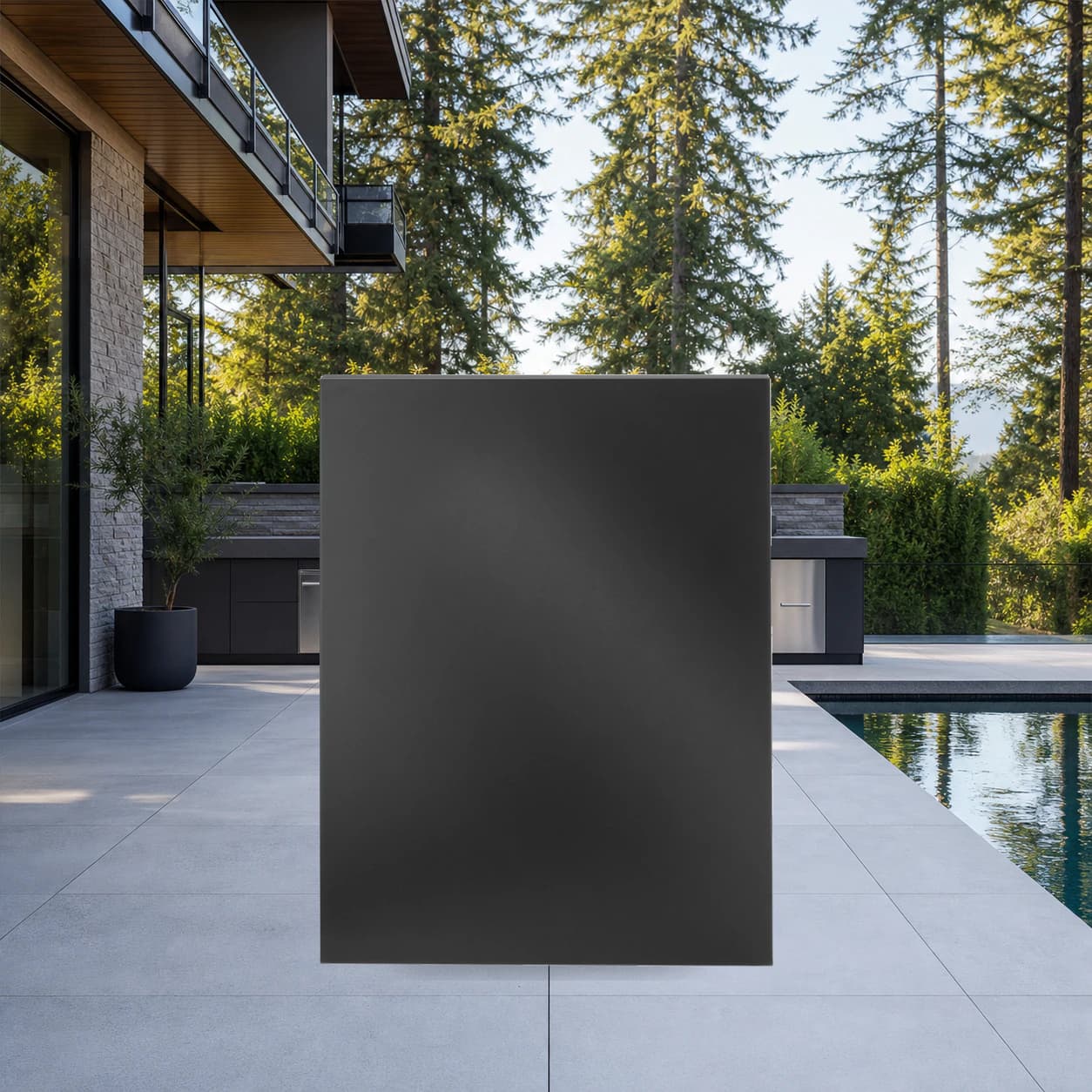 OASIS® End Panel, Matte Black in a modern poolside backyard