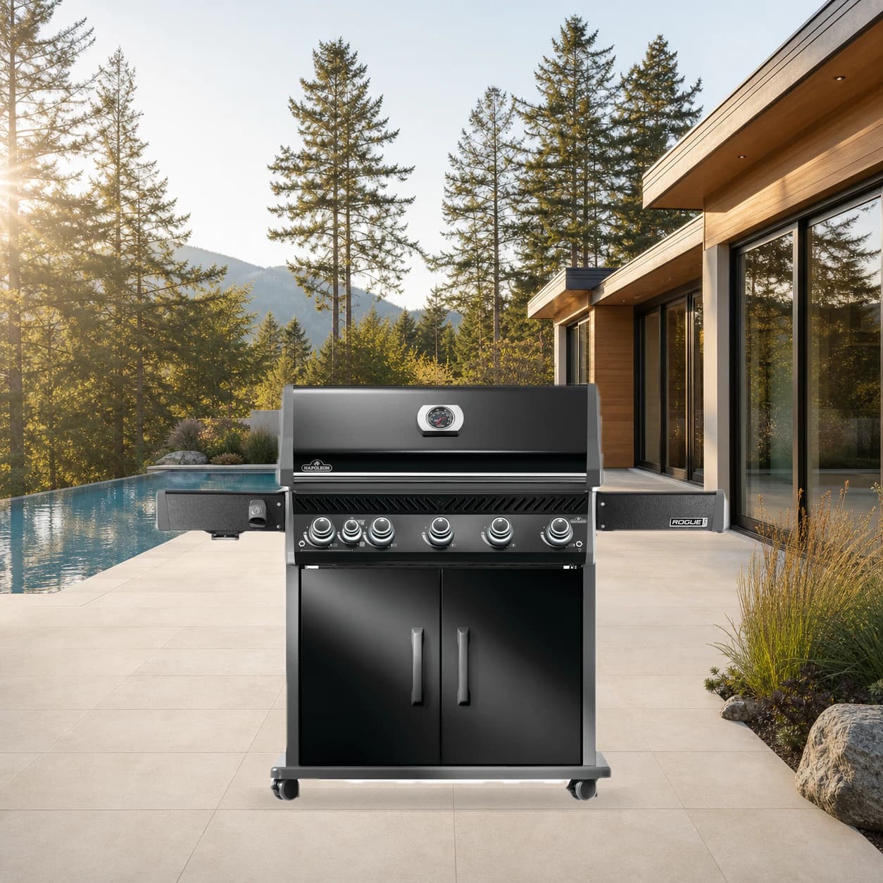 Rogue® PRO 625 Propane Gas Grill with Infrared Side Burner, Black in a modern poolside backyard