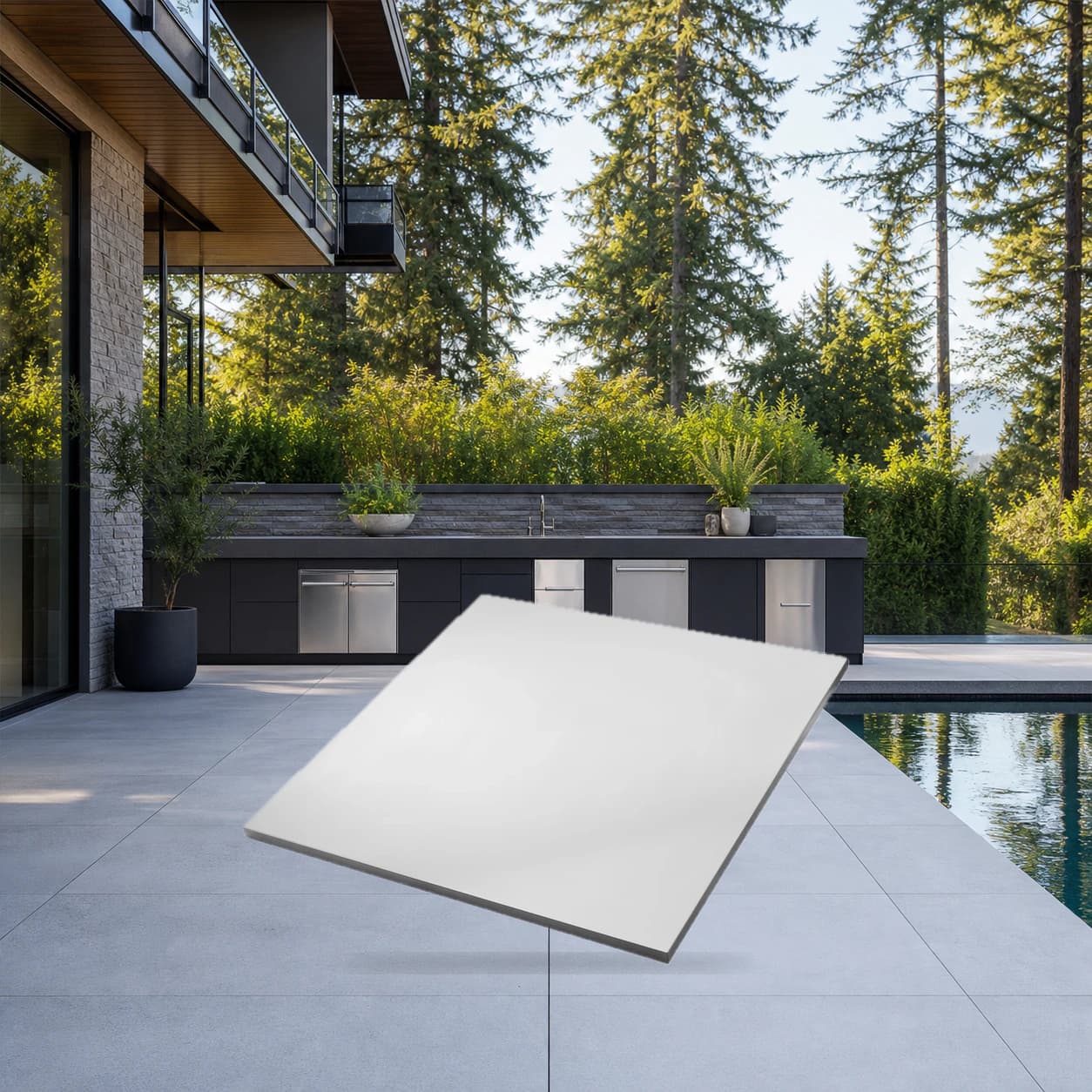 OASIS® Universal 24" x 24" Stainless Steel Countertop in a modern poolside backyard