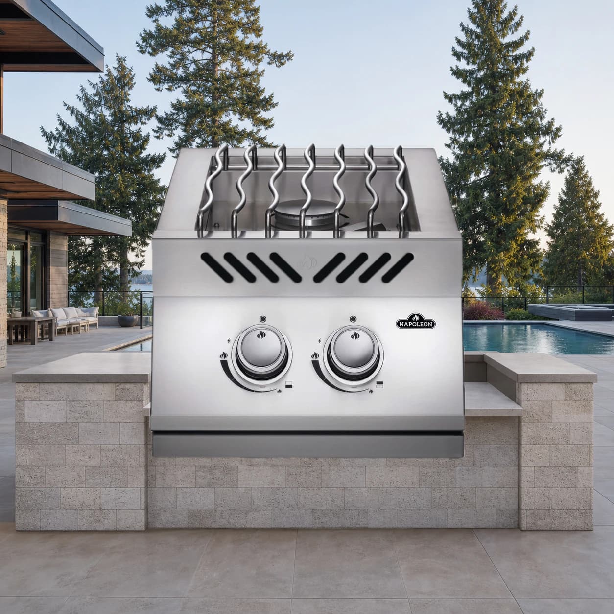 Built-in 500 Series Inline Dual Range Top Burner, Stainless Steel Cover in a modern poolside backyard