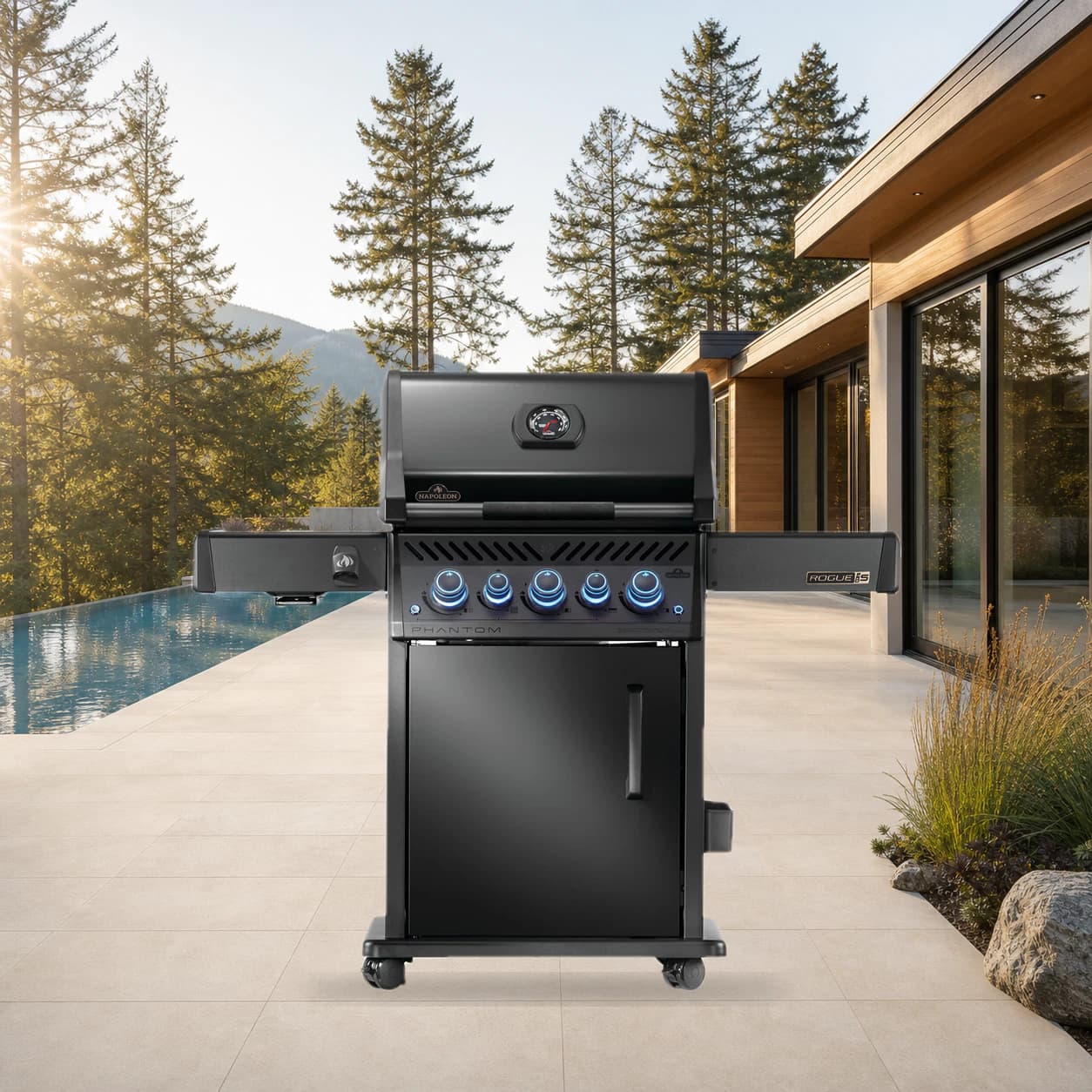 Phantom Rogue® PRO-S 425 Natural Gas Grill with Infrared Side and Rear Burners, Matte Black in a modern poolside backyard