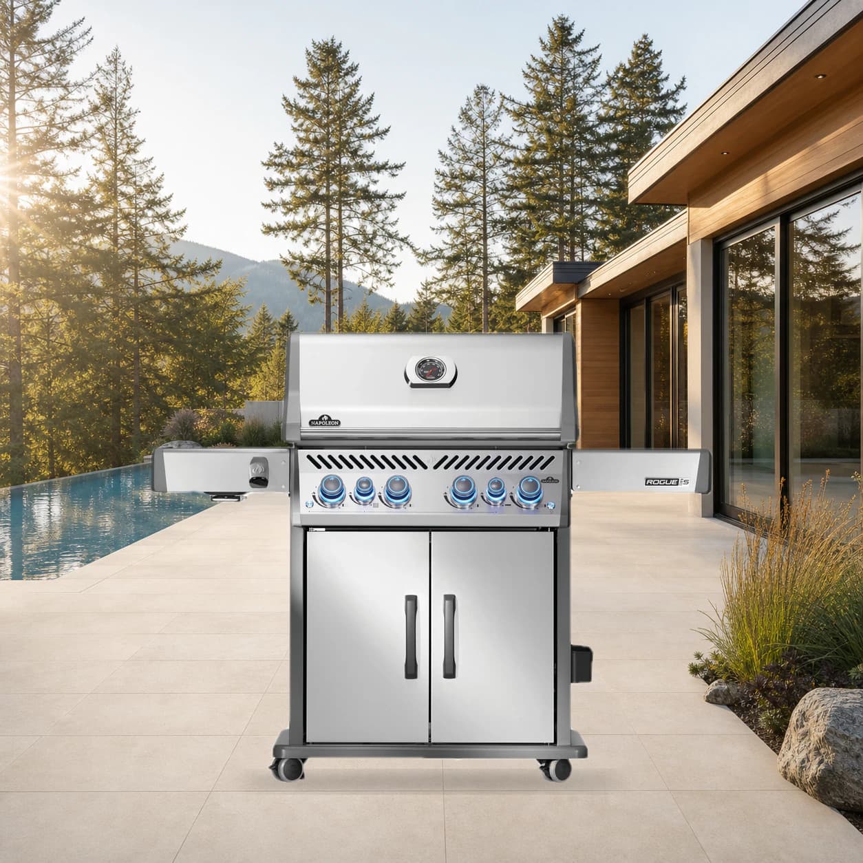 Rogue® PRO-S 525 Natural Gas Grill with Infrared Side and Rear Burners, Stainless Steel in a modern poolside backyard