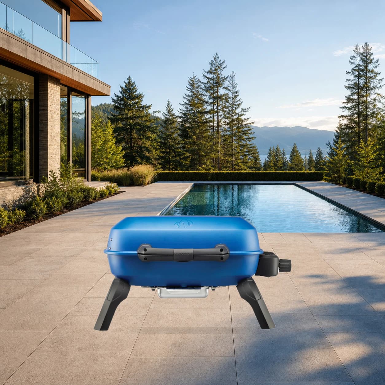 TravelQ™ 240 Portable Propane Gas Grill, Blue in a modern poolside backyard