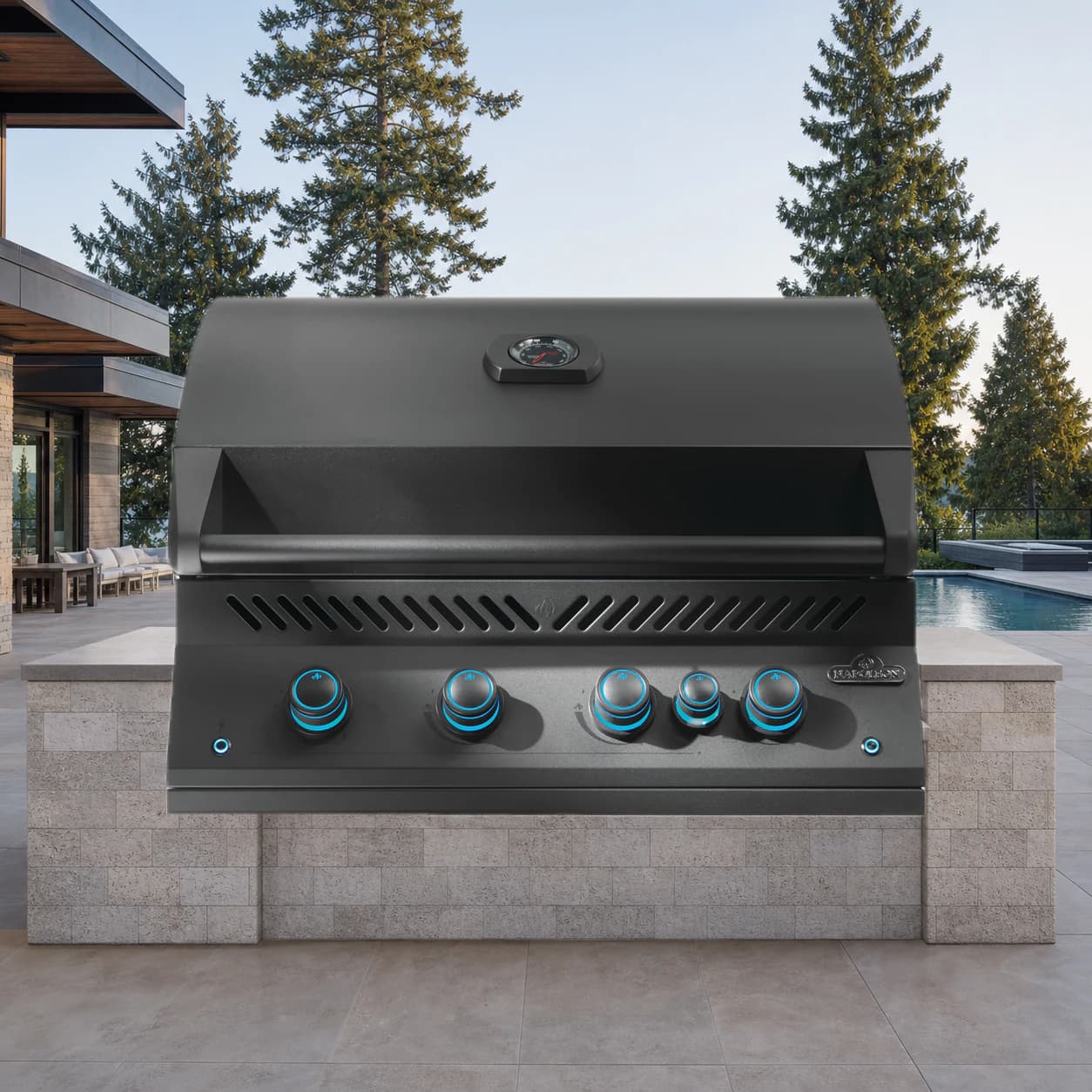 Built-In 700 Series 32" with Infrared Rear Burner, Propane, Matte Black in a modern poolside backyard
