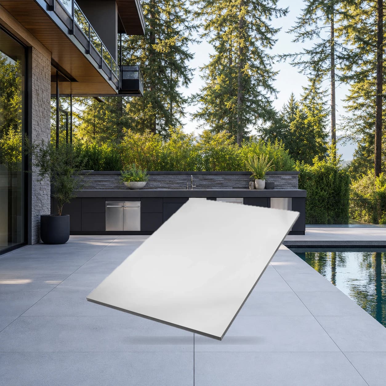 OASIS® 36" x 24" Stainless Steel End Panel for Waterfall Edge in a modern poolside backyard