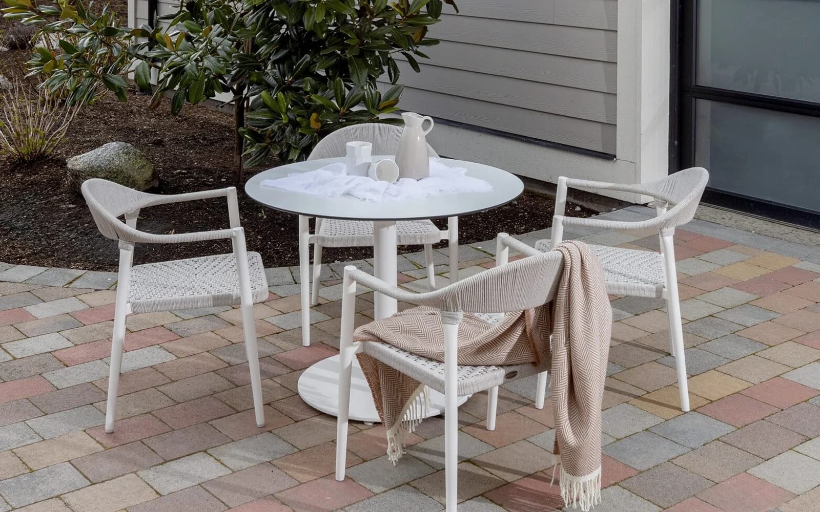 Ratana Ballina Collection furniture in a modern Pacific Northwest outdoor living setting.