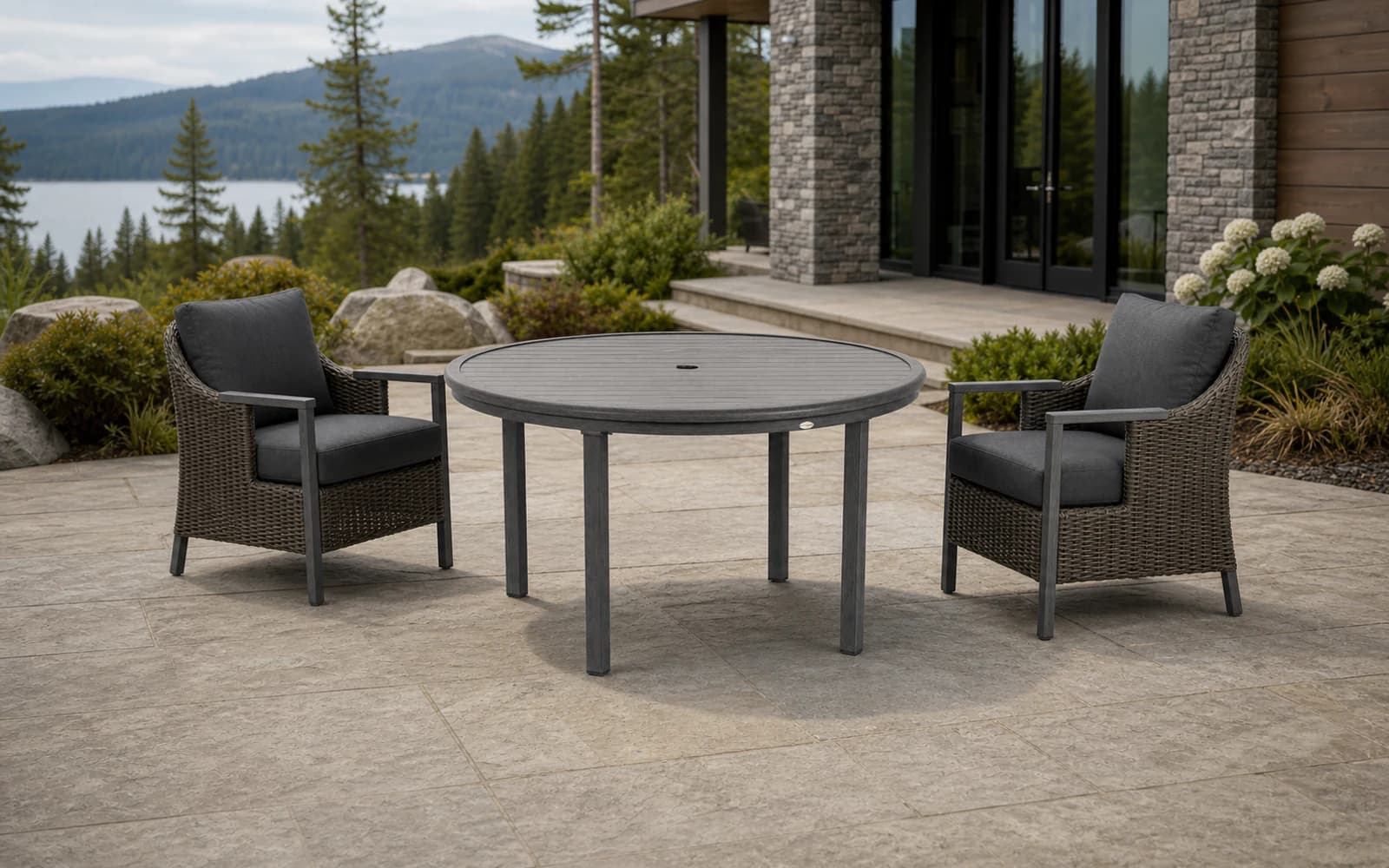 Ratana Canbria Collection furniture in a modern Pacific Northwest outdoor living setting.