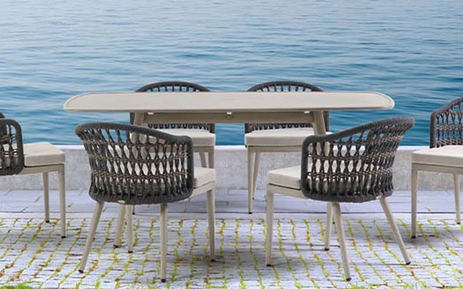Ratana Coconut Grove Collection furniture in a modern Pacific Northwest outdoor living setting.