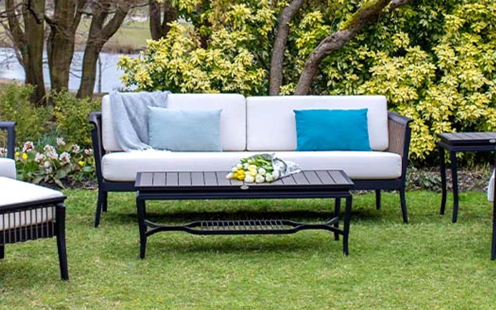 Ratana Copacabana Collection furniture in a modern Pacific Northwest outdoor living setting.