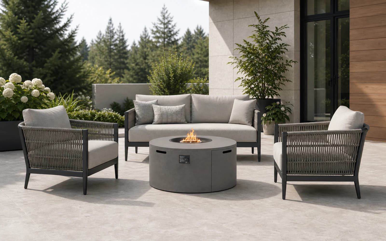 Ratana Fiamma Collection furniture in a modern Pacific Northwest outdoor living setting.