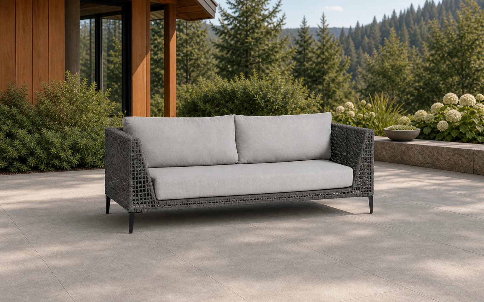 Ratana Genval Collection furniture in a modern Pacific Northwest outdoor living setting.