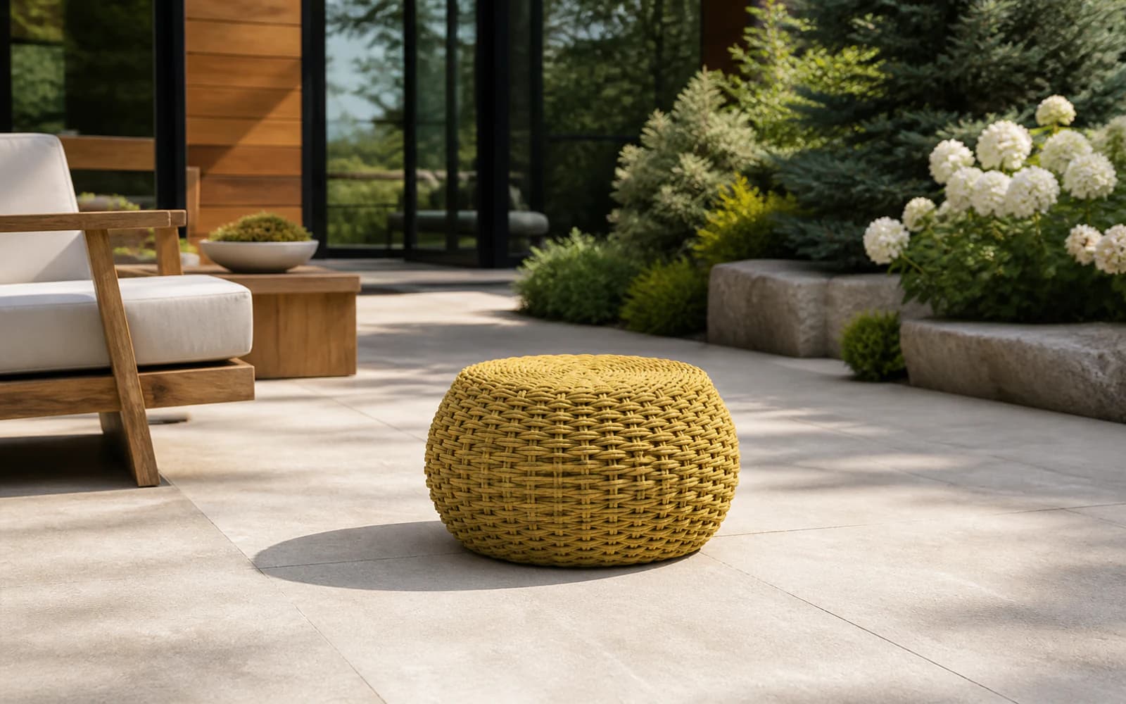 Ratana Giro Collection furniture in a modern Pacific Northwest outdoor living setting.