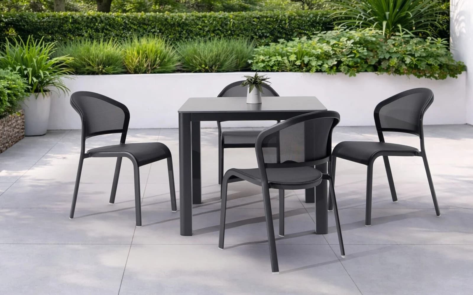 Ratana Lago Collection furniture in a modern Pacific Northwest outdoor living setting.