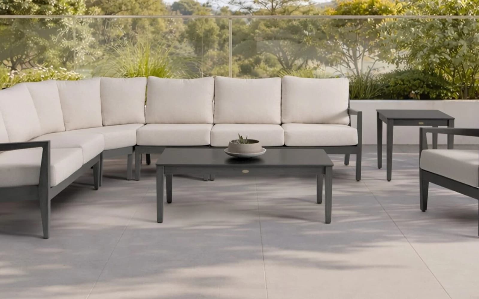 Ratana Lucia Collection furniture in a modern Pacific Northwest outdoor living setting.