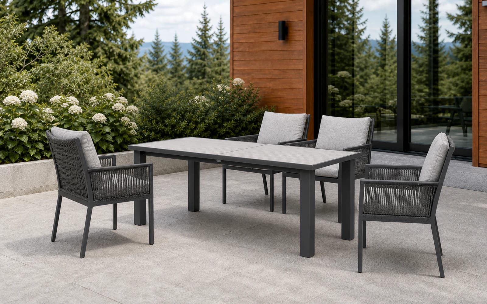 Ratana Mezo Collection furniture in a modern Pacific Northwest outdoor living setting.