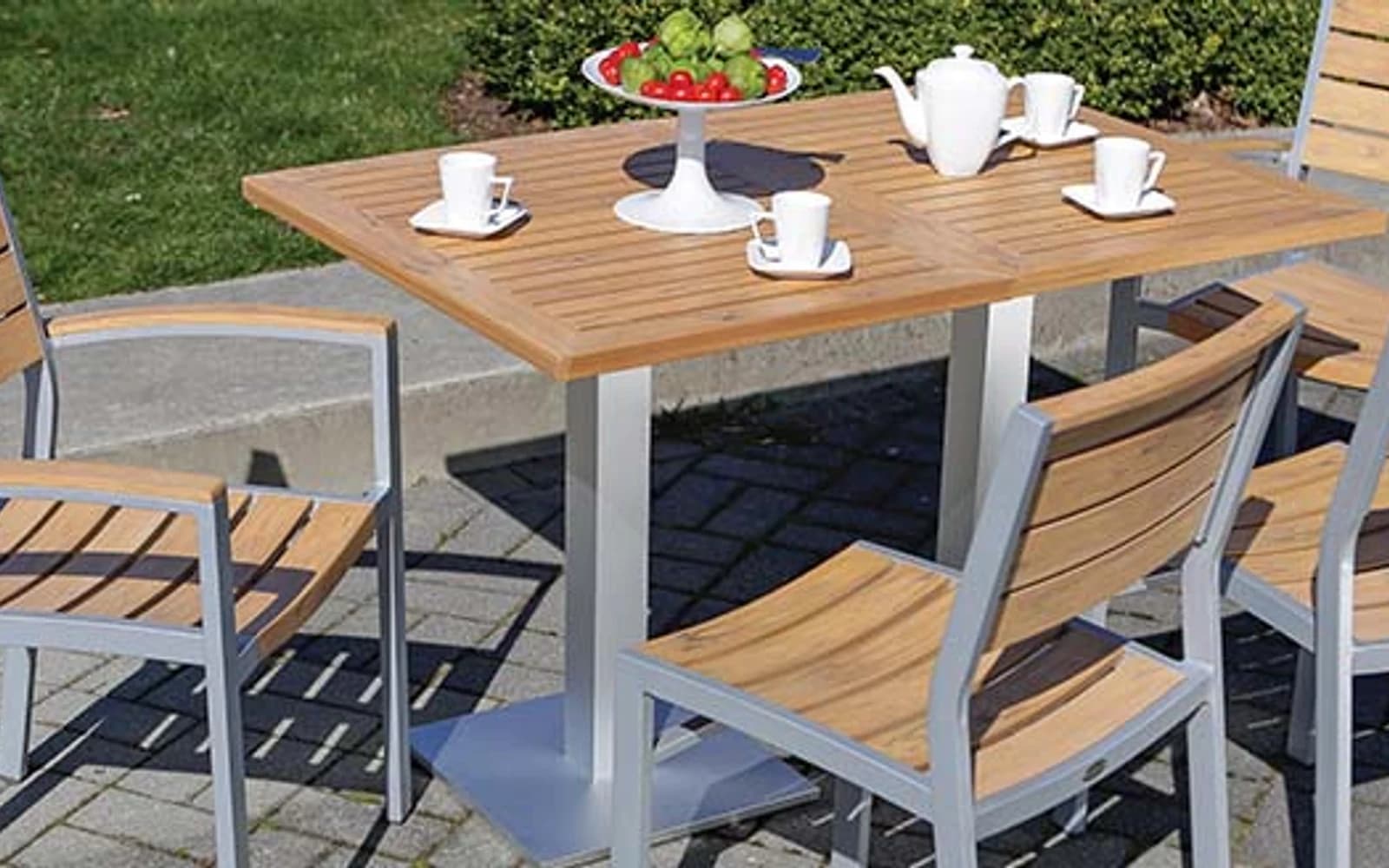 Ratana New Mirage Collection furniture in a modern Pacific Northwest outdoor living setting.