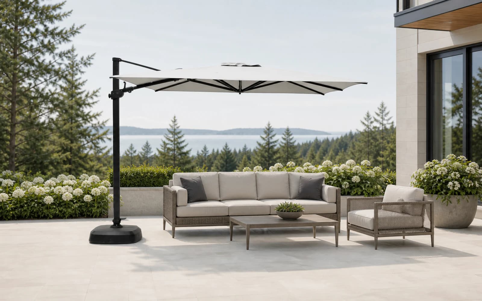 Ratana Patio Umbrellas & Bases furniture in a modern Pacific Northwest outdoor living setting.