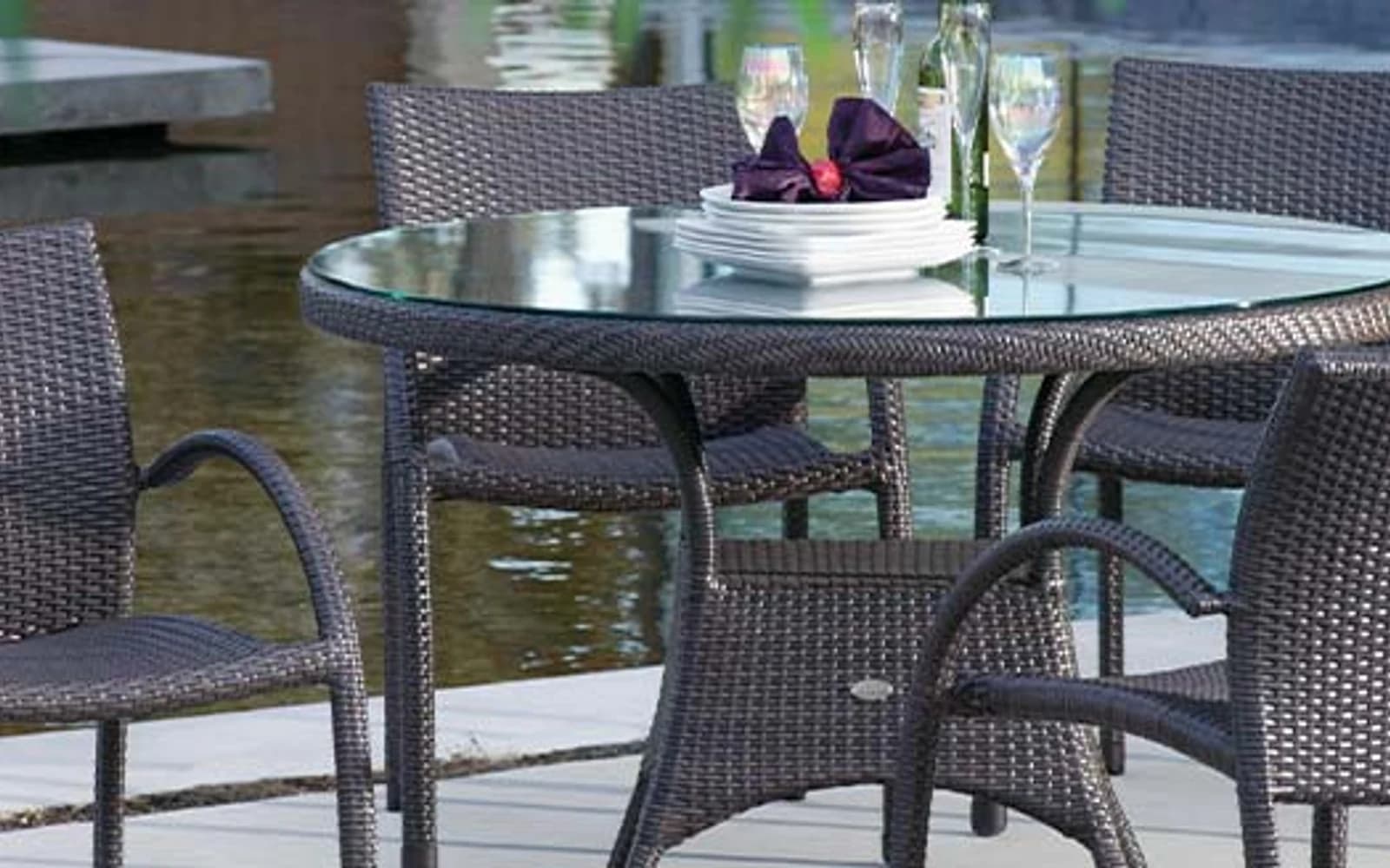 Ratana Riviera Collection furniture in a modern Pacific Northwest outdoor living setting.