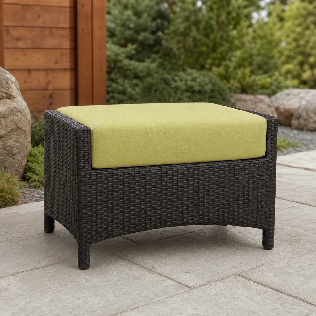 Ratana FN23016 Palm Harbor Ottoman with chartreuse cushion and dark woven frame on a premium stone patio.