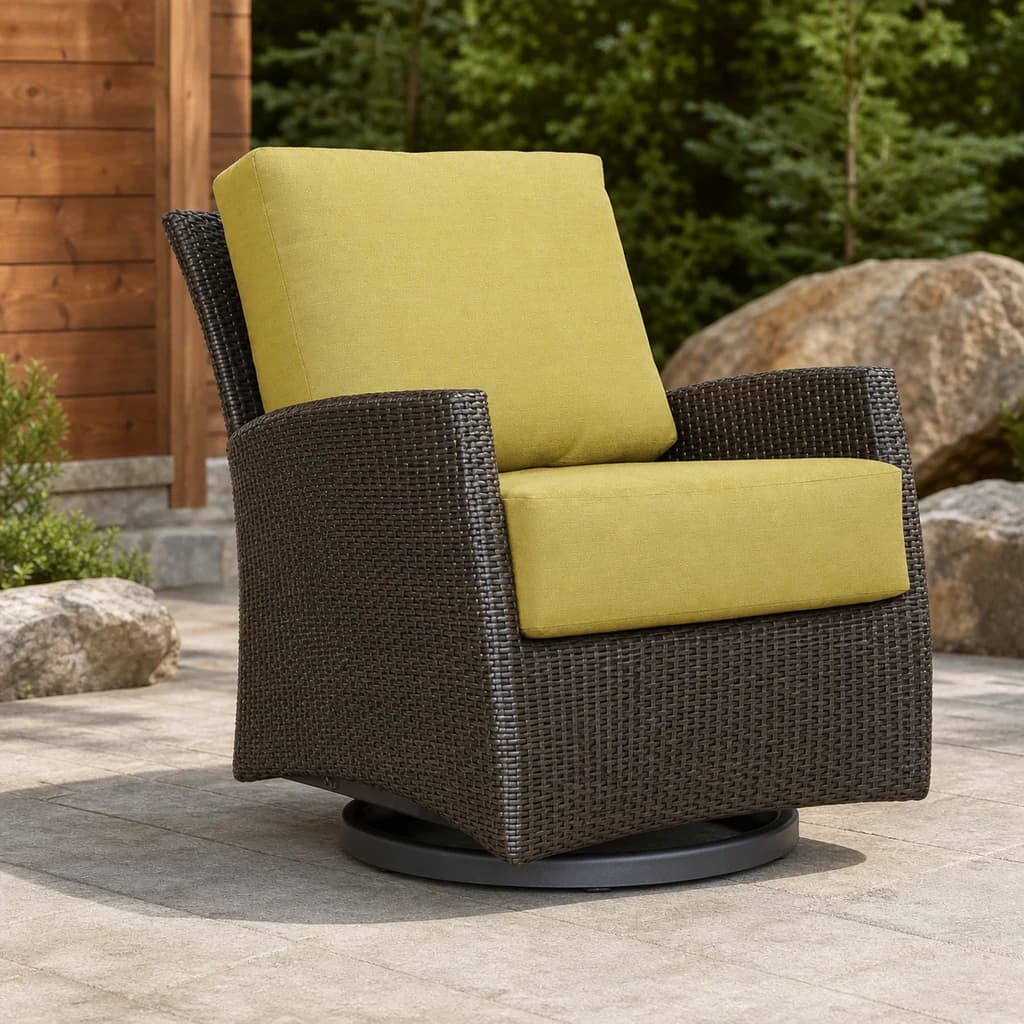 Ratana FN23090 Palm Harbor Swivel Gliding Club Chair with chartreuse cushions and dark wicker on a cedar patio.