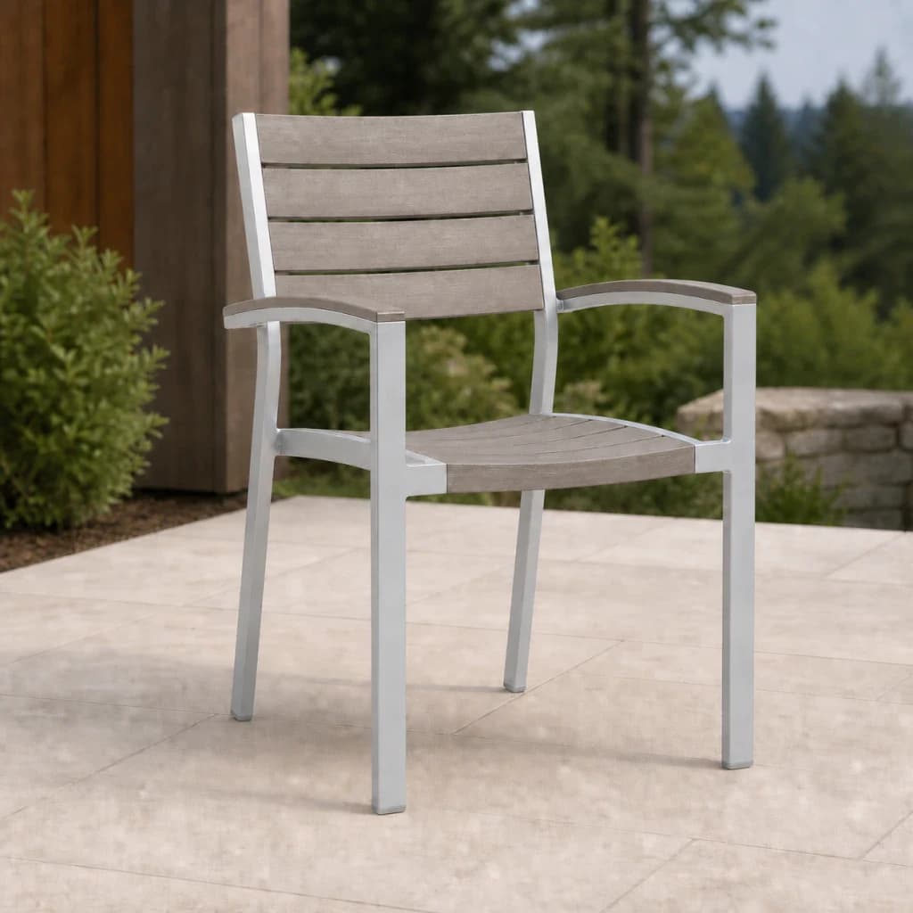 Ratana FN42912 New Mirage stacking arm chair in Grey Oak Everrawood with Silver 02 frame on a premium Pacific Northwest patio.