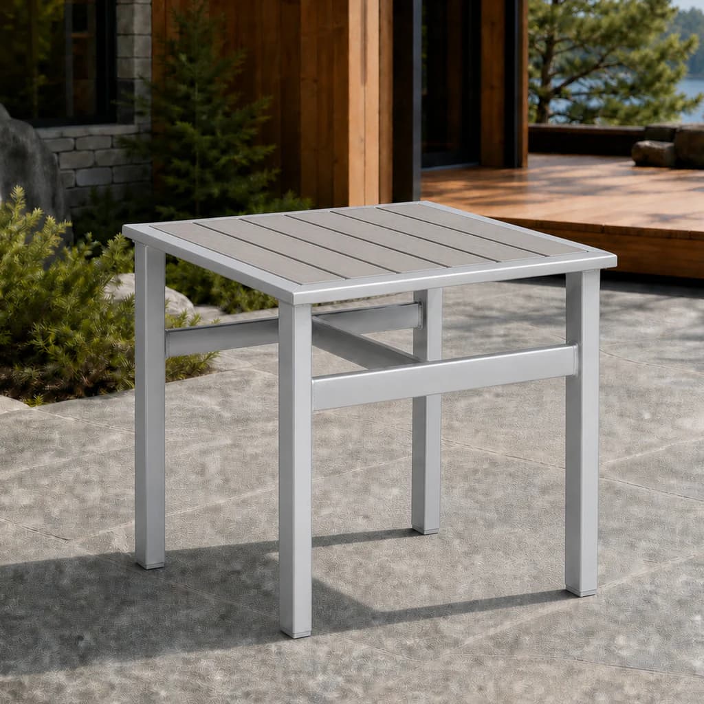 Ratana FN43505 Lucca square side table with gray slatted Everrawood top and silver frame on a stone terrace.