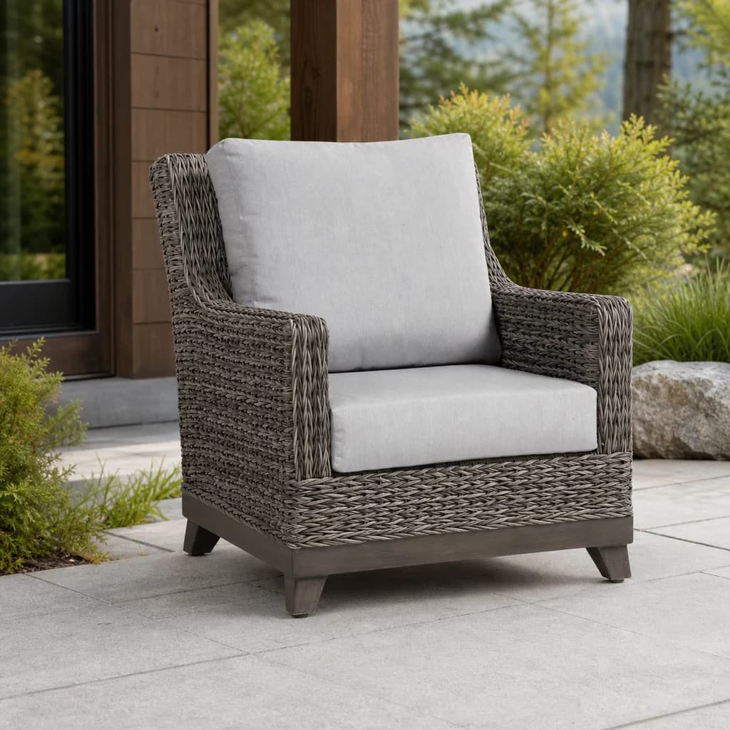 Ratana FN51701 Boston Club Chair with light gray cushions and taupe woven frame on a premium Pacific Northwest patio.
