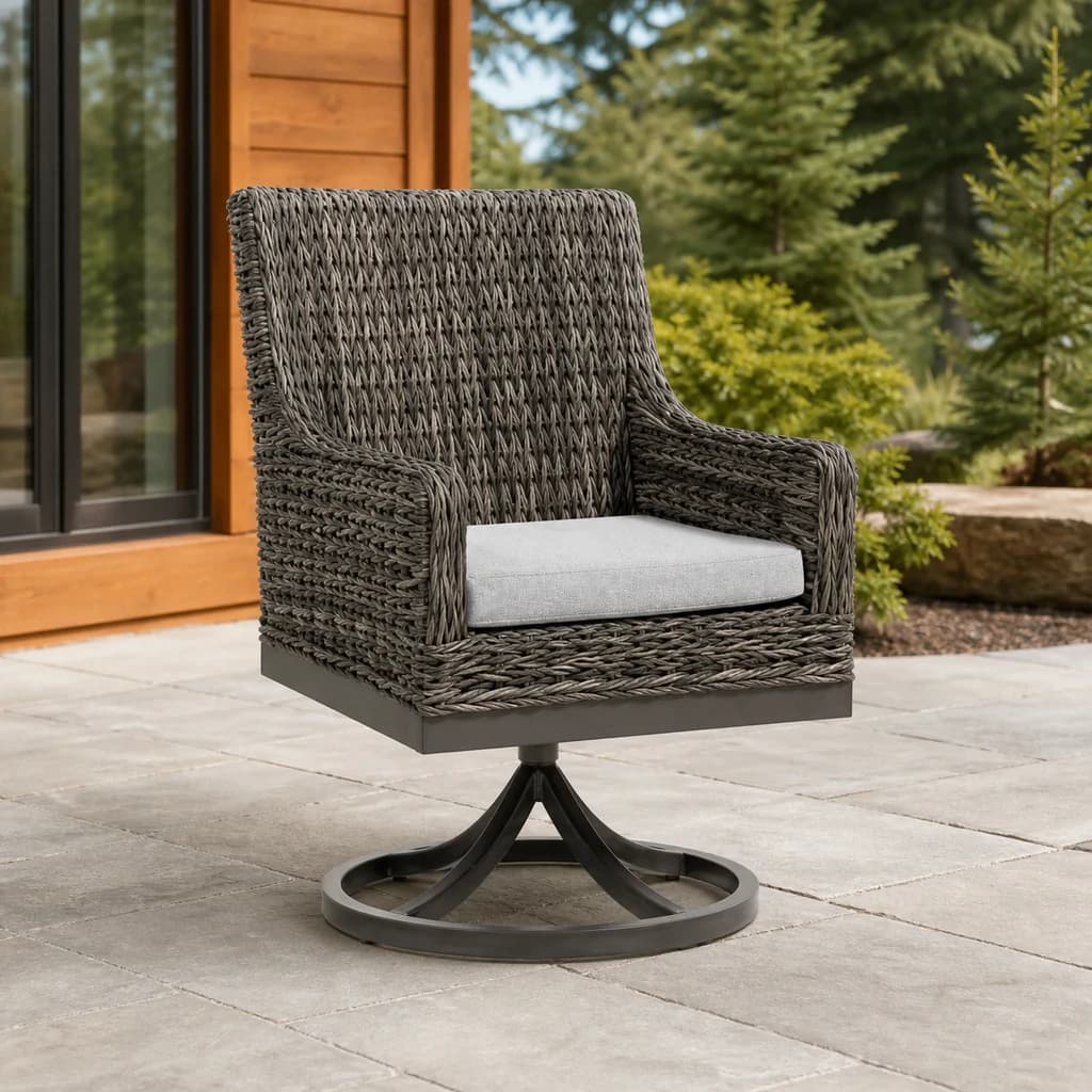 Ratana FN51758 Boston Swivel Rocking Arm Chair with taupe wicker and light gray cushion on a Pacific Northwest patio.