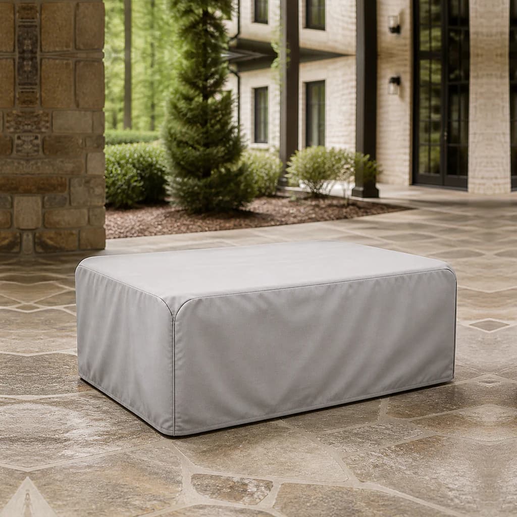 Ratana FN52599-CT50 50-inch rectangular fire-pit protective cover on a premium patio.