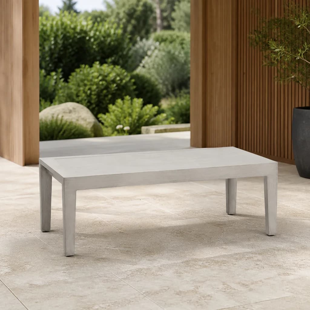 Ratana FN54404 Lucia sintered stone coffee table in a refined patio lounge setting.