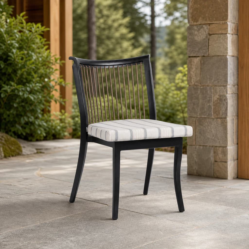 Ratana FN55011 Copacabana dining side chair on a cedar and stone evergreen patio.