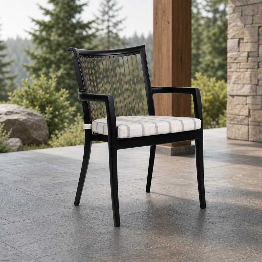 Ratana FN55012 Copacabana dining arm chair on an evergreen mountain patio.