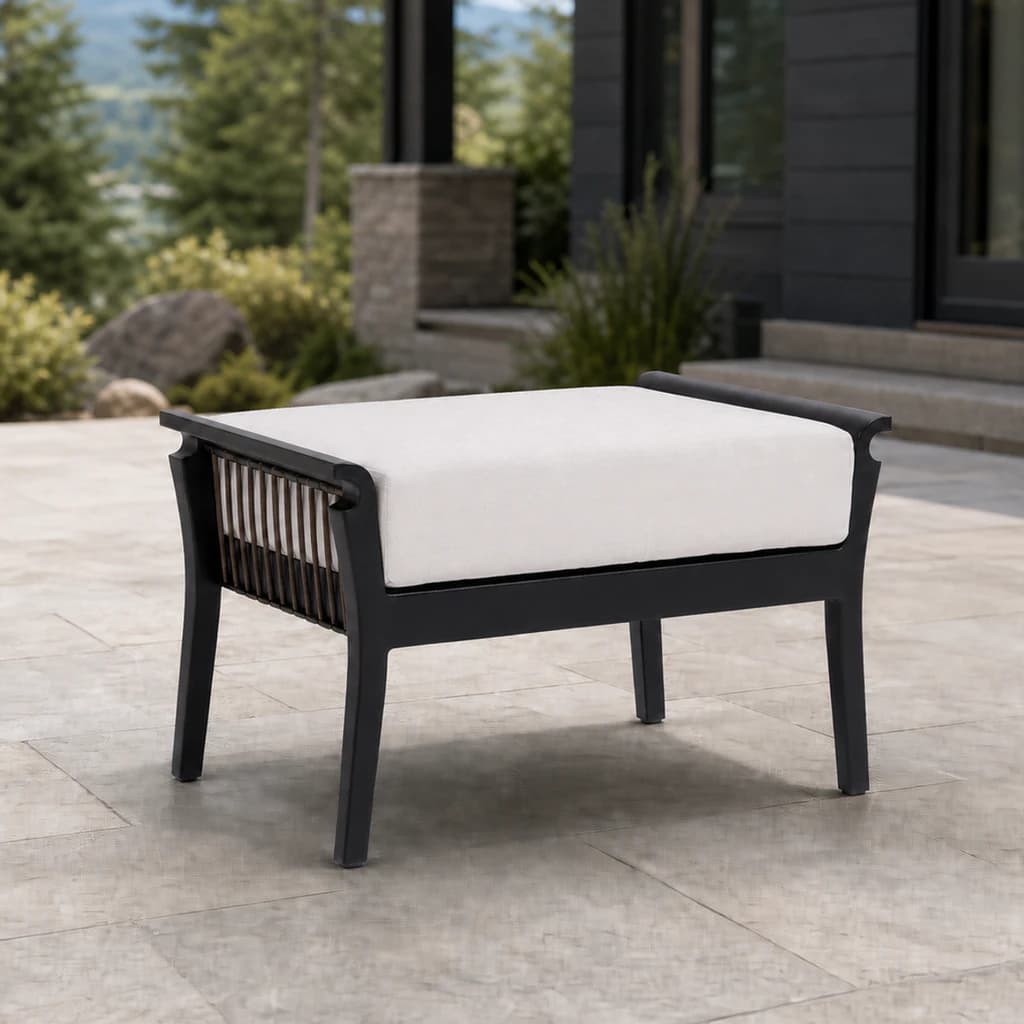 Ratana FN55016 Copacabana ottoman with off-white cushion and cord sides on a stone patio.