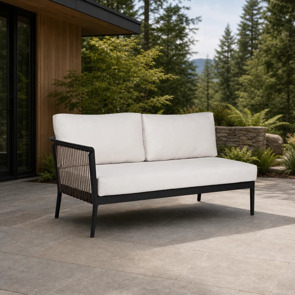 Ratana FN55052-L Copacabana two-seat left-arm module on an evergreen patio.