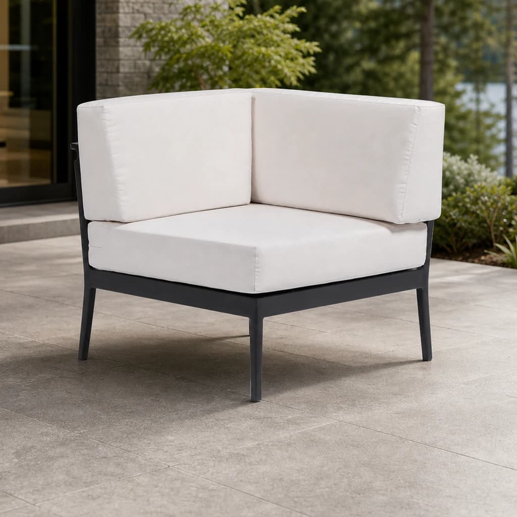 Ratana FN55053-N Copacabana corner module with perpendicular back cushions on a stone patio.