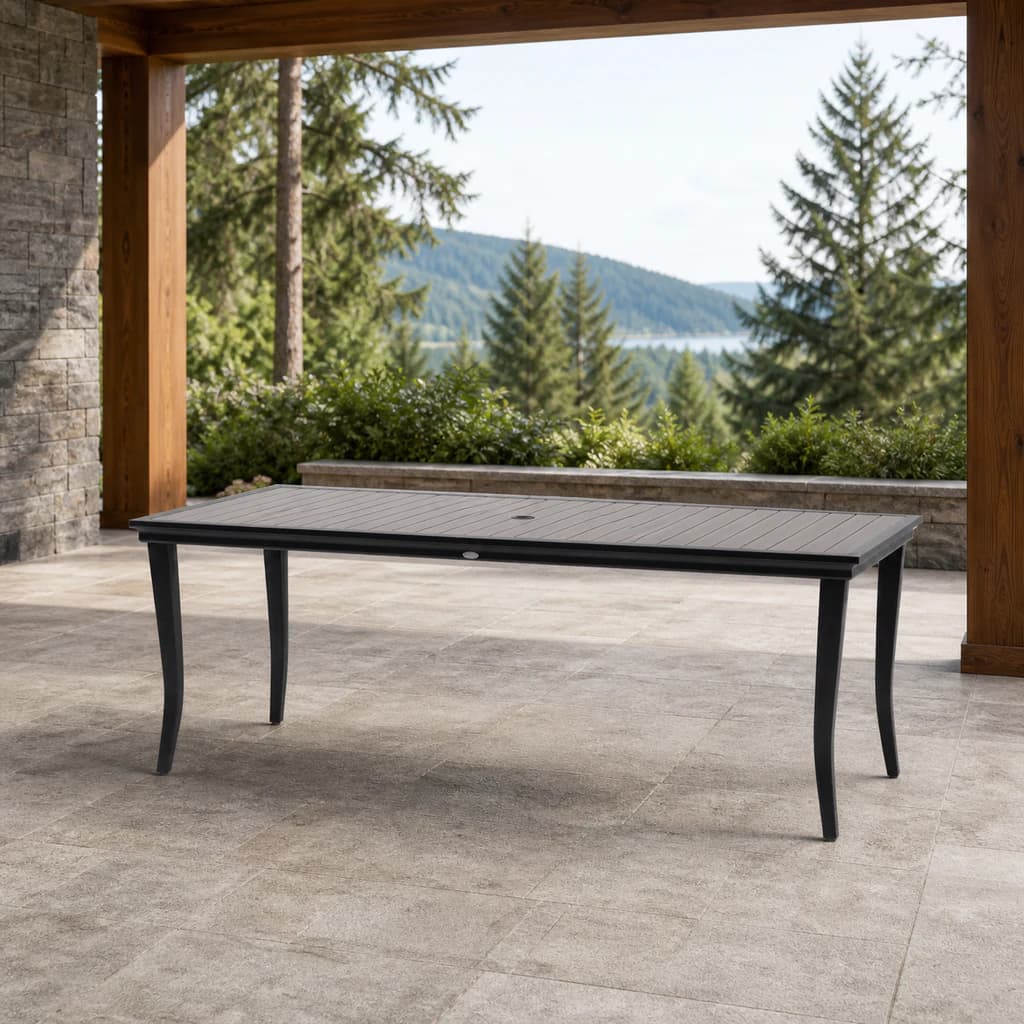 Ratana FN55062 Copacabana 84-inch rectangular dining table with umbrella hole on a lake-view patio.