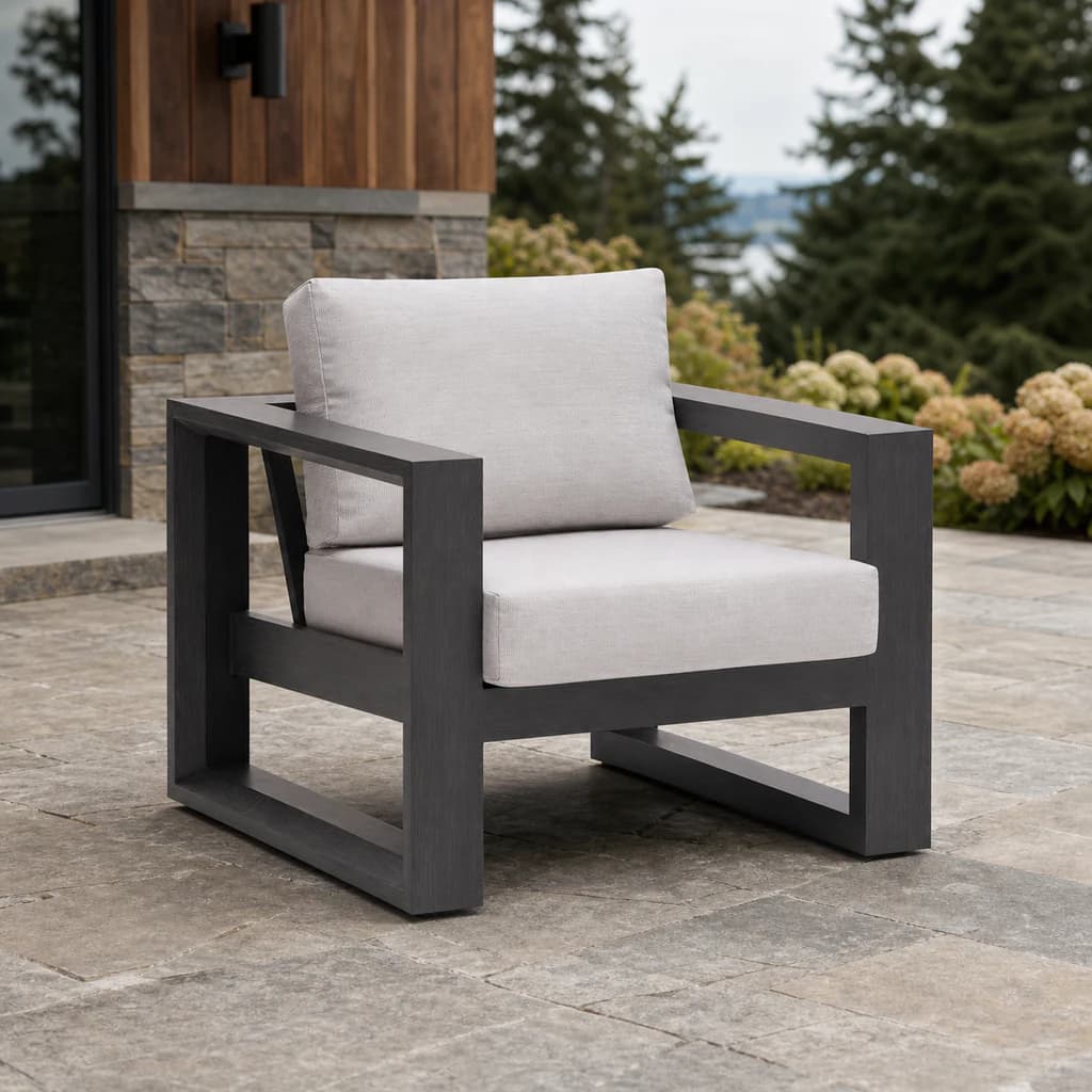 Ratana FN57001 Element 5.0 club chair on a Pacific Northwest stone patio.