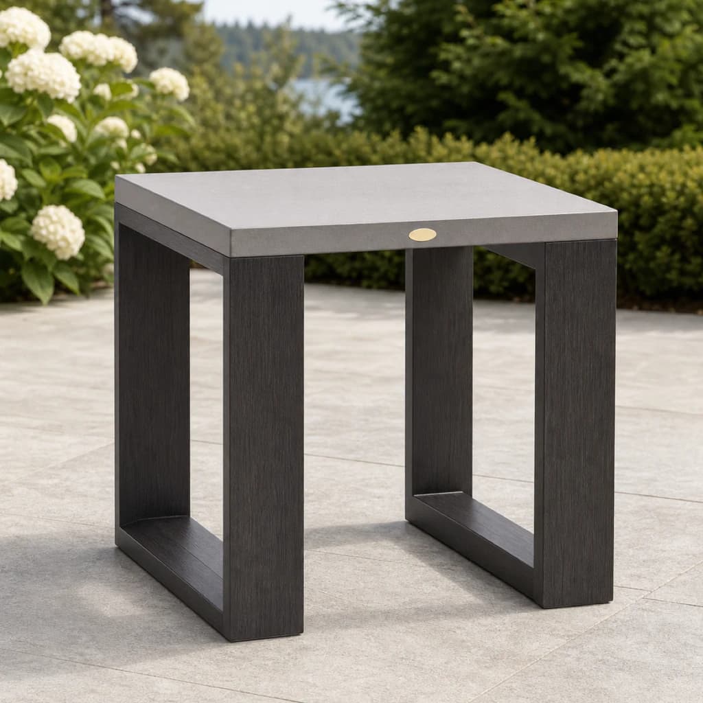 Ratana FN57006 Element 5.0 sintered-stone side table on a lakeside garden patio.