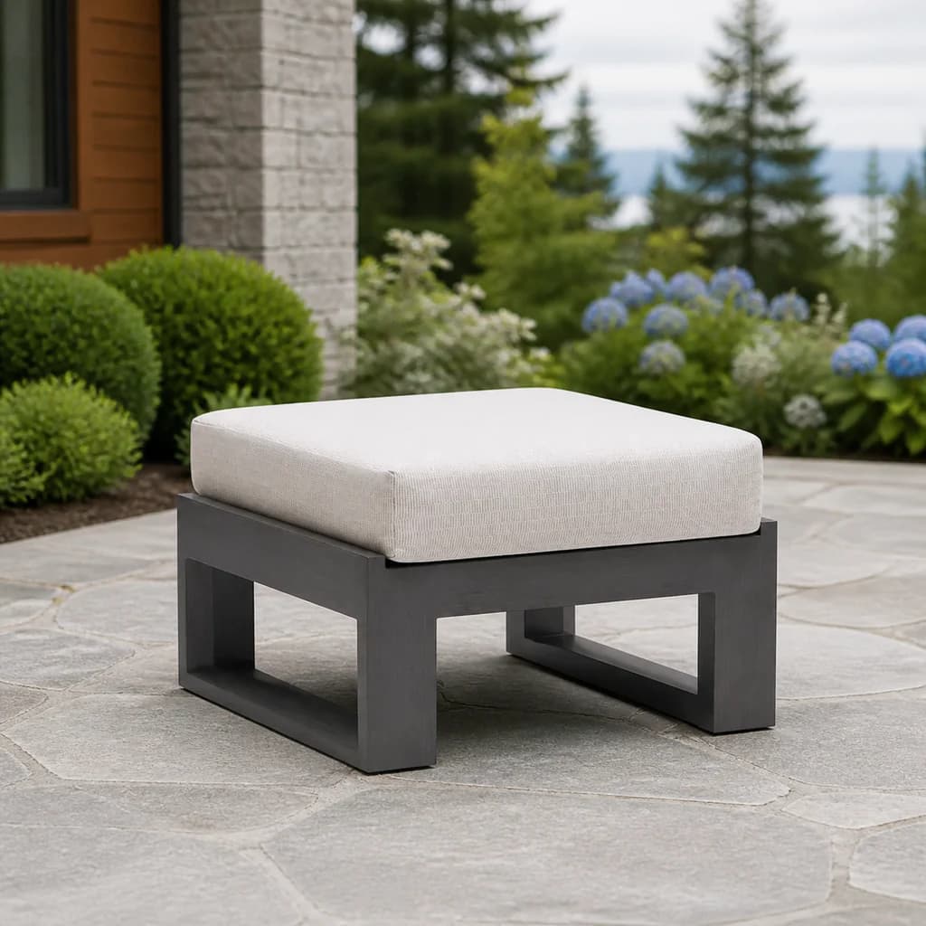 Ratana FN57016 Element 5.0 cushion ottoman on a garden stone patio.