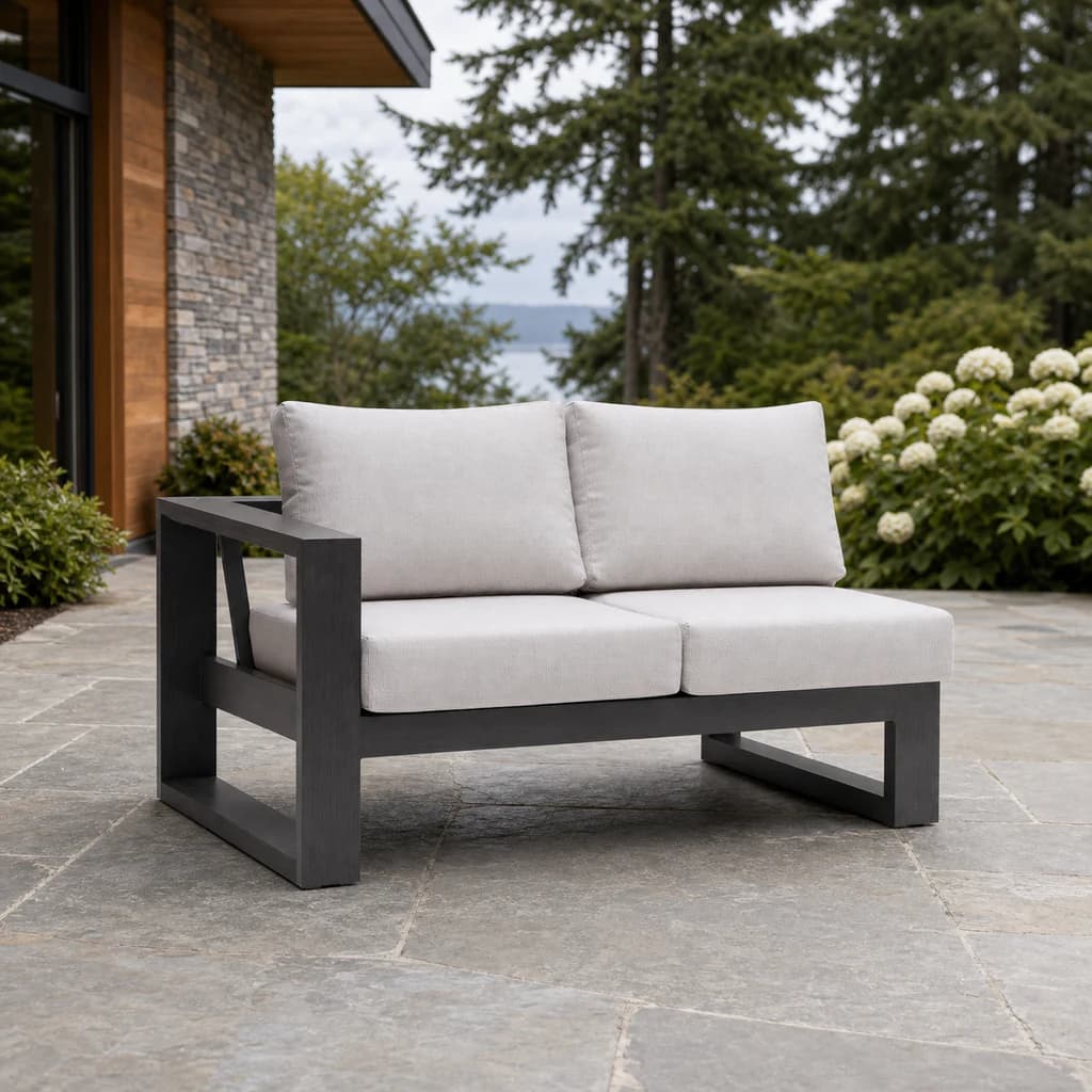 Ratana FN57052-L Element 5.0 two-seat left-arm module on an evergreen patio.