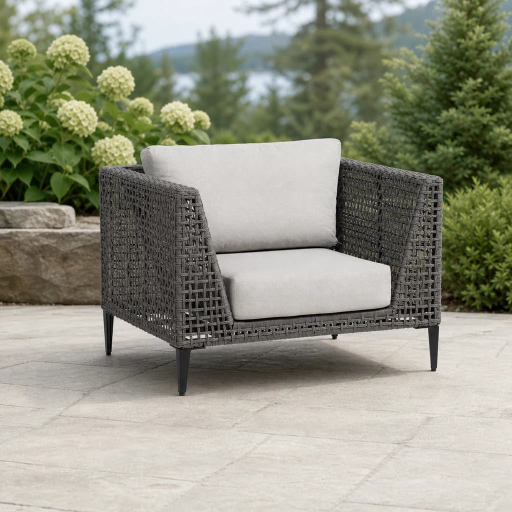 Ratana FN57201 Genval club chair on a hydrangea garden patio.