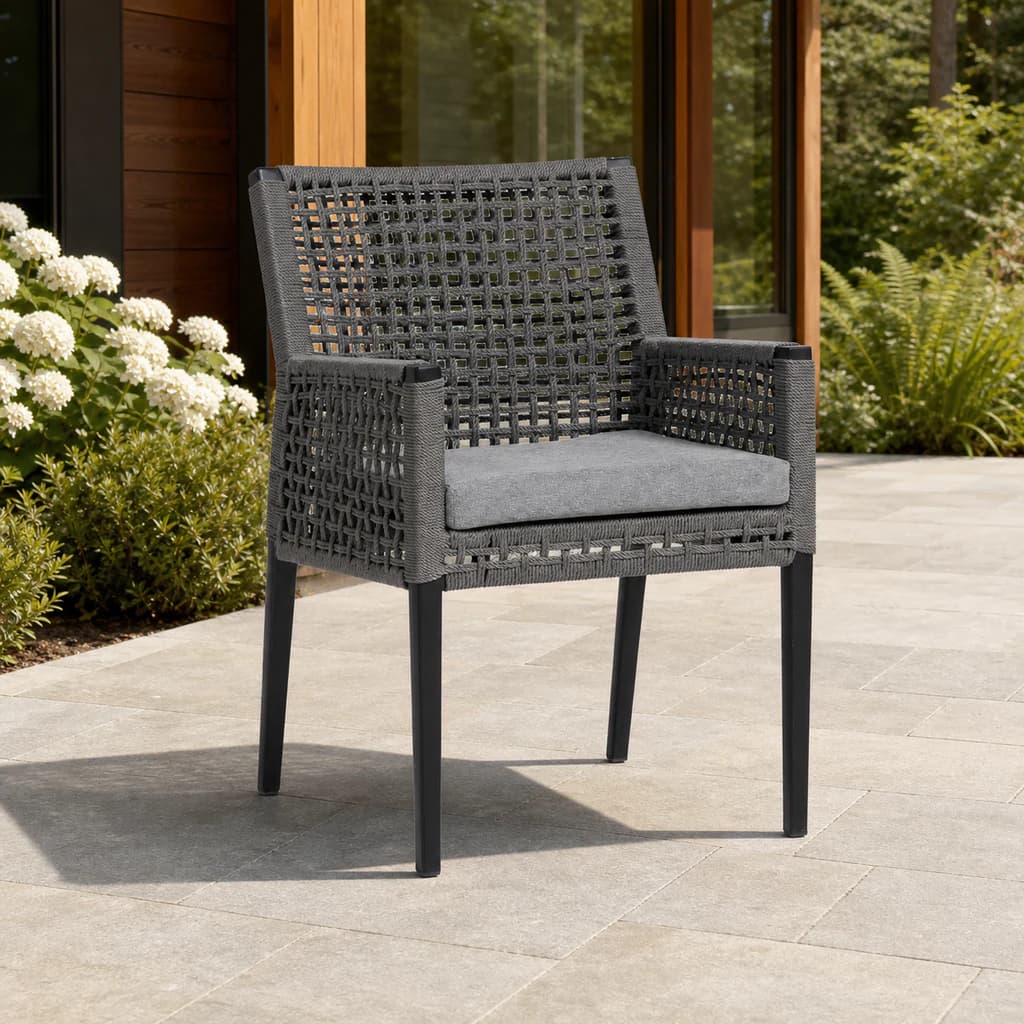 Ratana FN57212 Genval dining arm chair on a cedar garden patio.