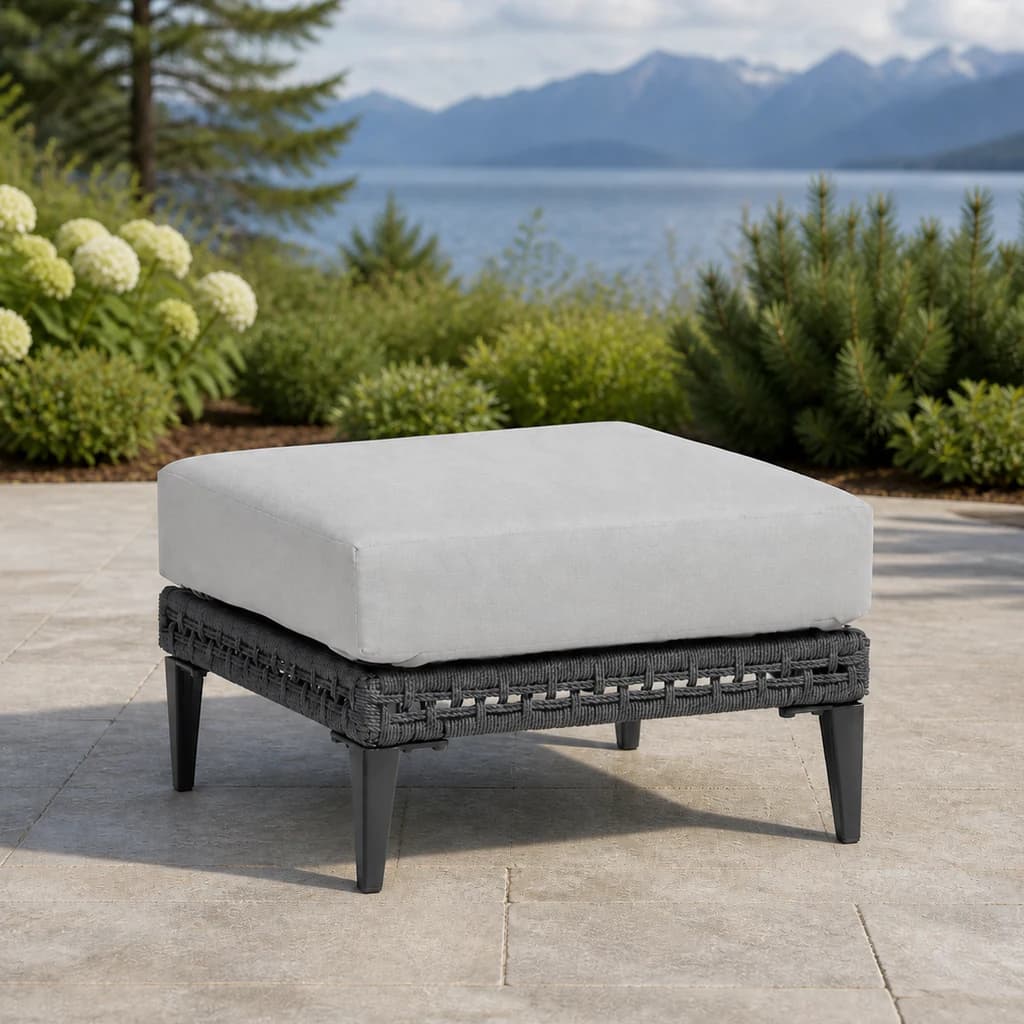 Ratana FN57216 Genval ottoman on a lake-view stone patio.