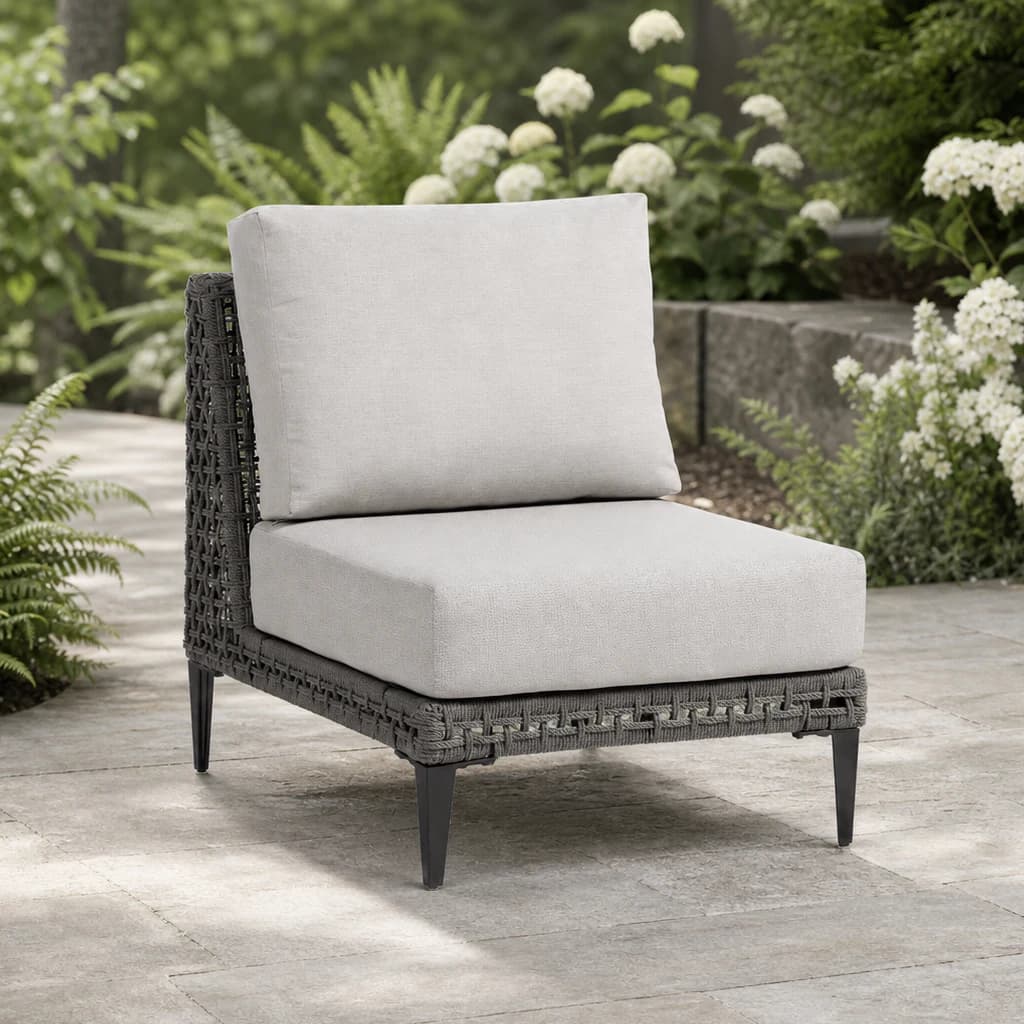 Ratana FN57253-C Genval armless chair module on a fern garden patio.