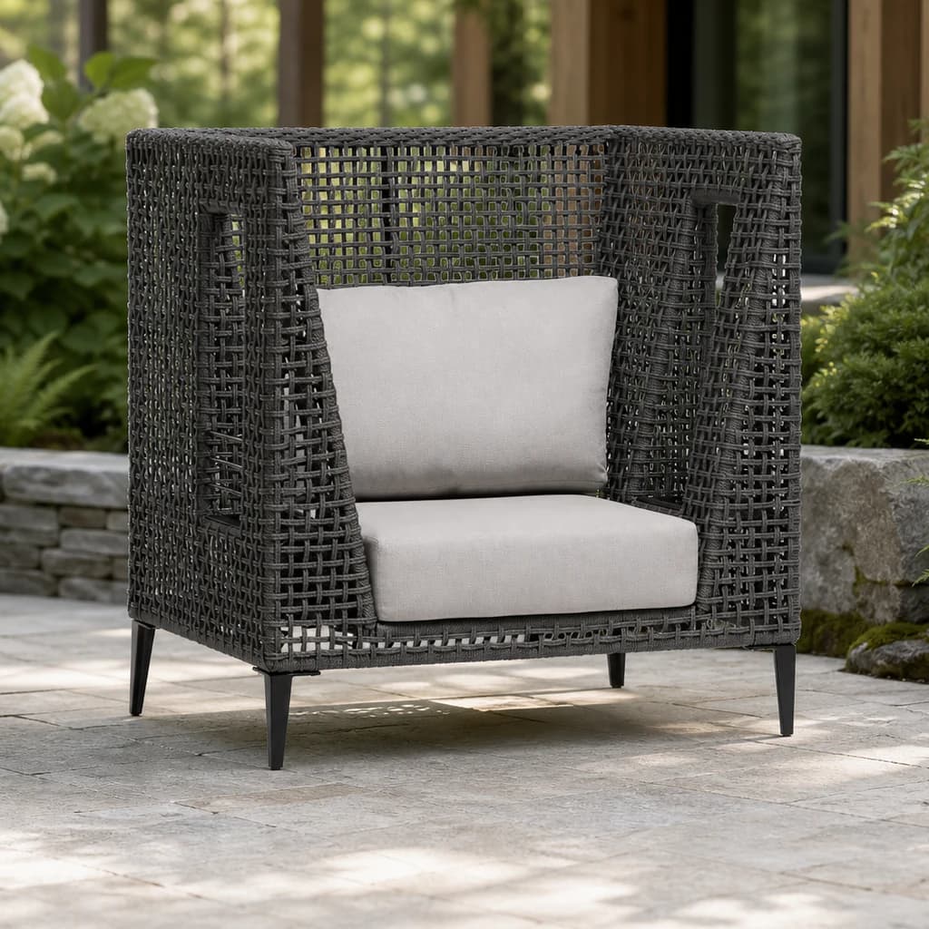 Ratana FN57285 Genval highback chair on a fern garden patio.