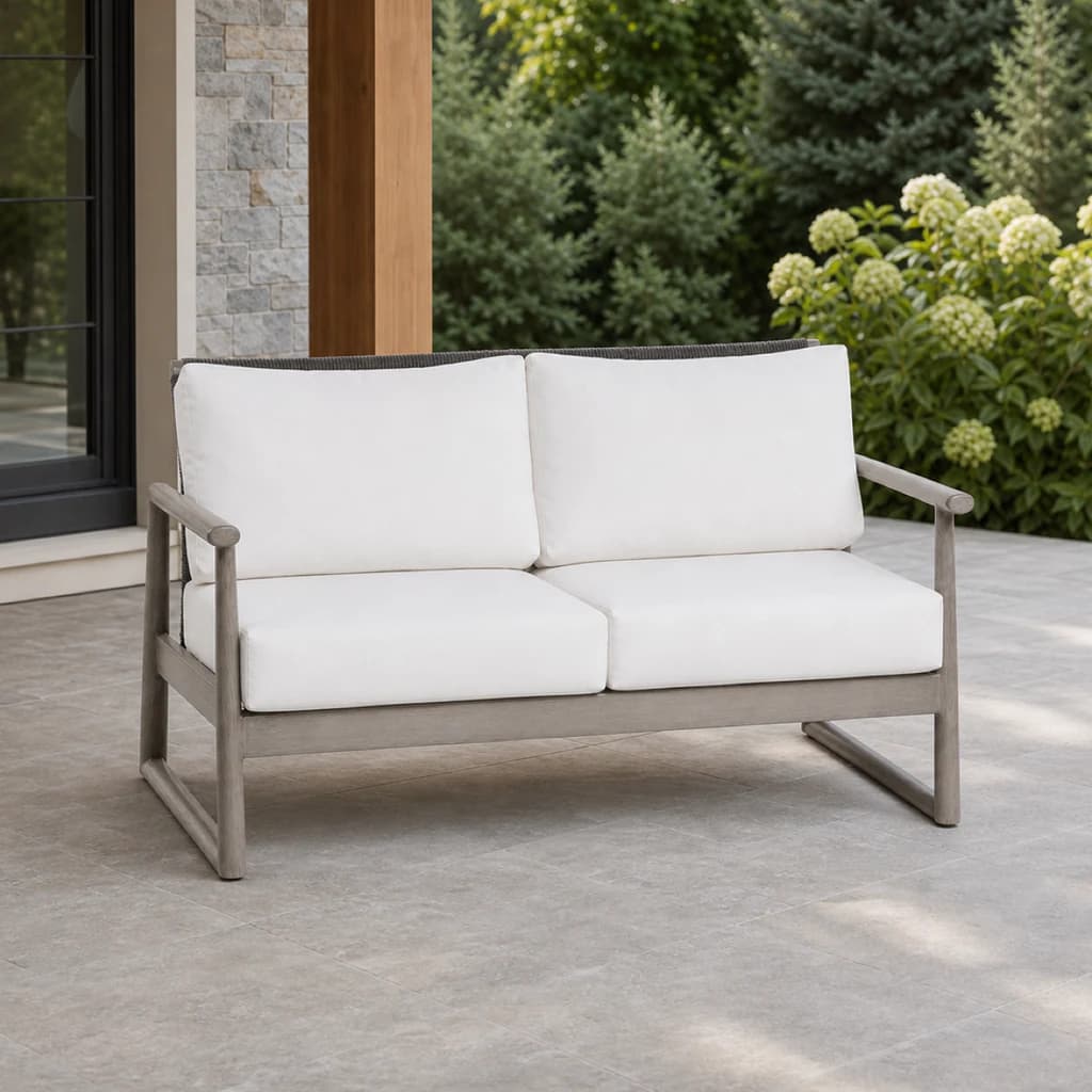 Ratana FN58702 Park West loveseat on a covered garden patio.