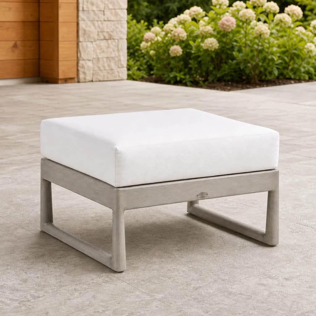 Ratana FN58716 Park West ottoman on a covered stone patio.